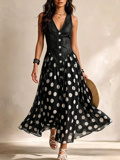 Adelia – abito lungo nero con corpetto effetto jeans e gonna a pois, frontale