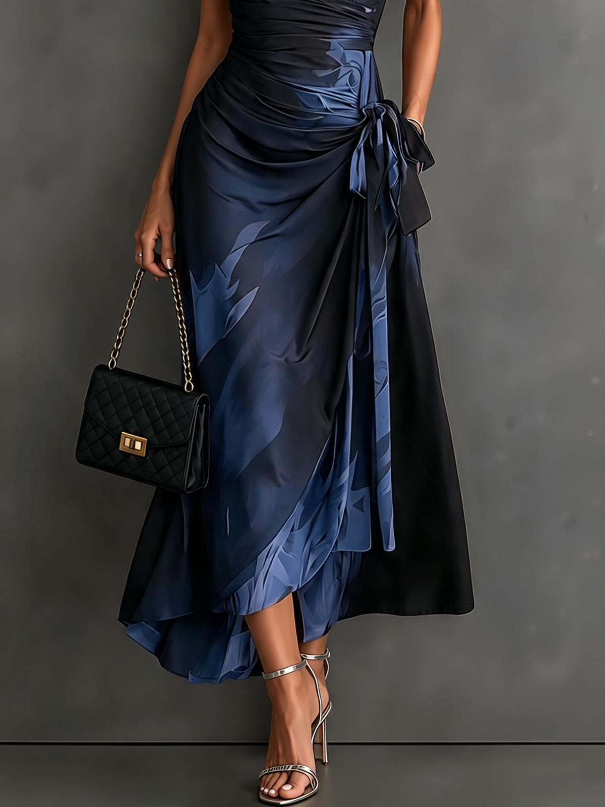 Rosella – abito blu, dettaglio gonna e nodo in vita
