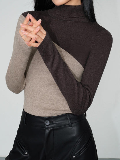 Filomena | Maglia Asimmetrica con Collo Alto e Dettaglio Patchwork
