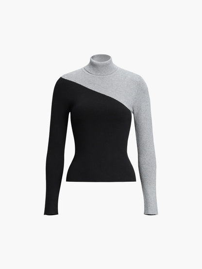 Filomena | Maglia Asimmetrica con Collo Alto e Dettaglio Patchwork