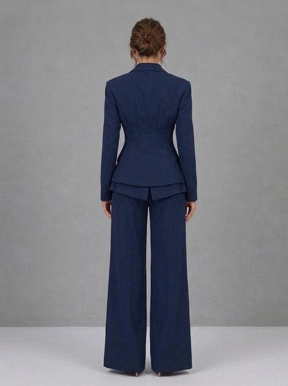 Alina — completo blazer e pantalone a palazzo blu navy, vista posteriore