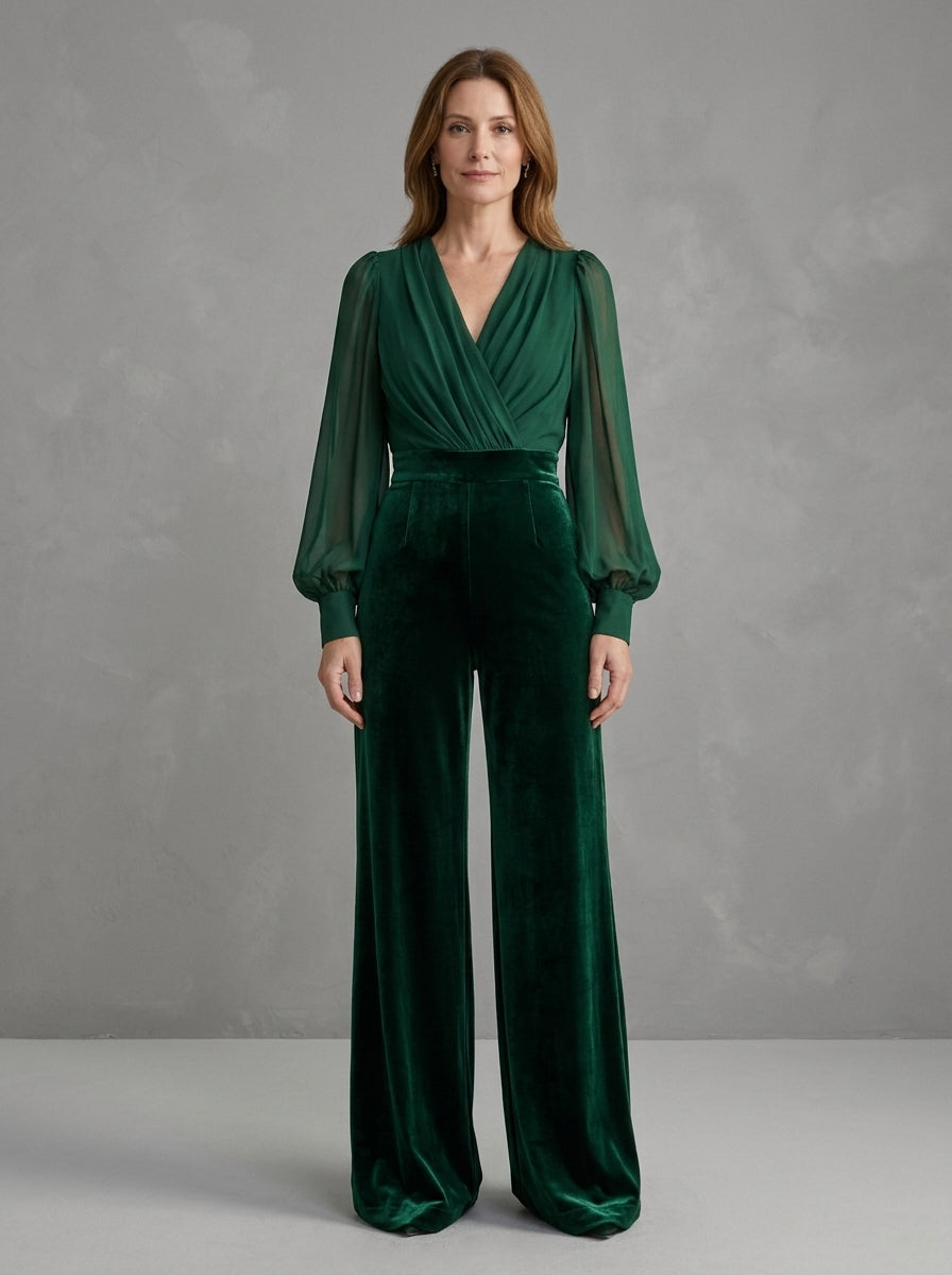 Bernadette — tuta verde bosco con maniche trasparenti e pantalone in velluto, vista frontale