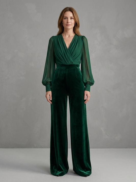 Bernadette — tuta verde bosco con maniche trasparenti e pantalone in velluto, vista frontale