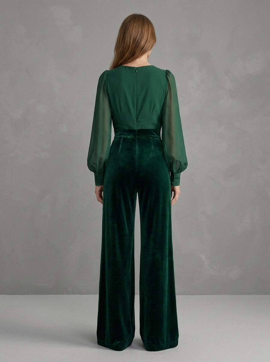 Bernadette — tuta verde bosco con maniche trasparenti e pantalone in velluto, vista posteriore