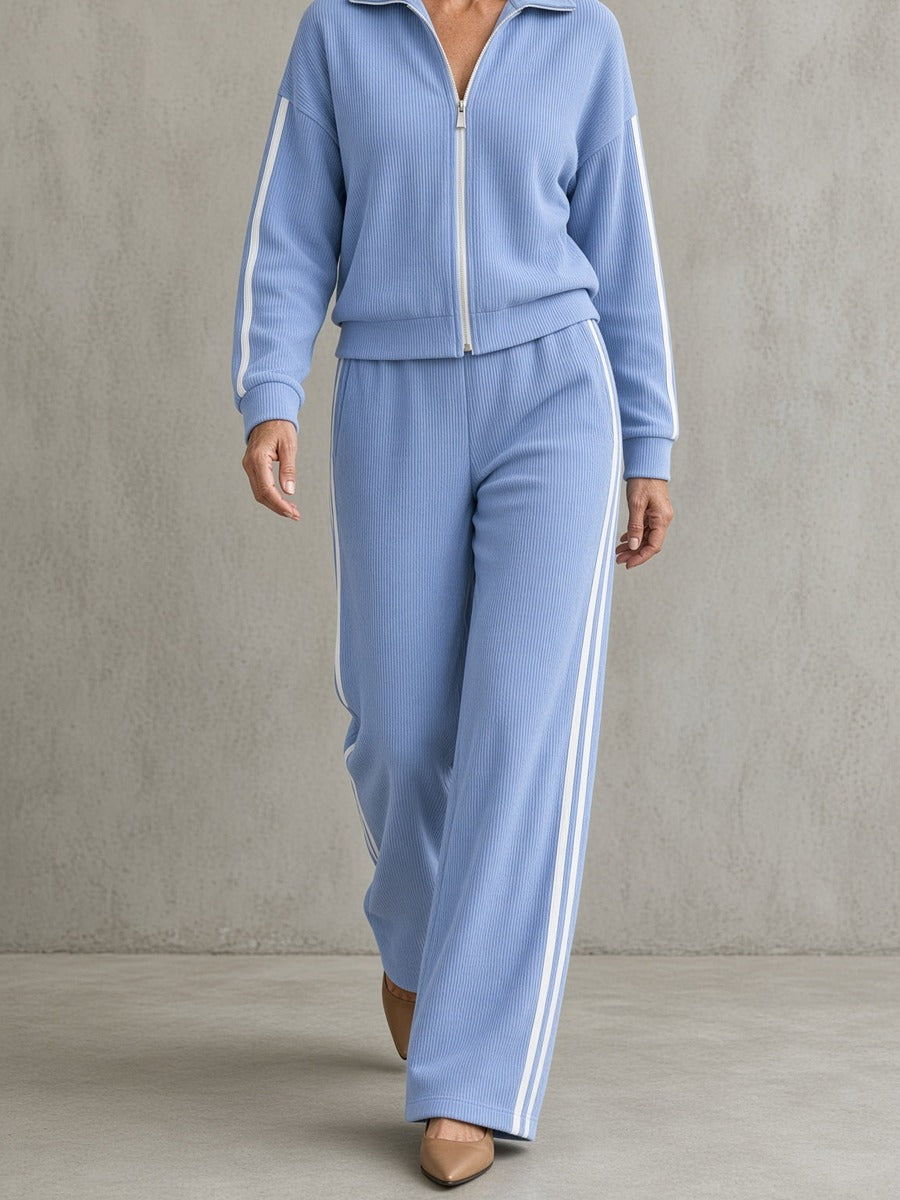 Wilma, completo con felpa a zip e pantalone ampio a bande, azzurro
