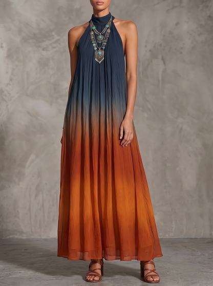 Paula, abito maxi in chiffon sfumato blu notte e ruggine con collo alto, vista frontale in studio
