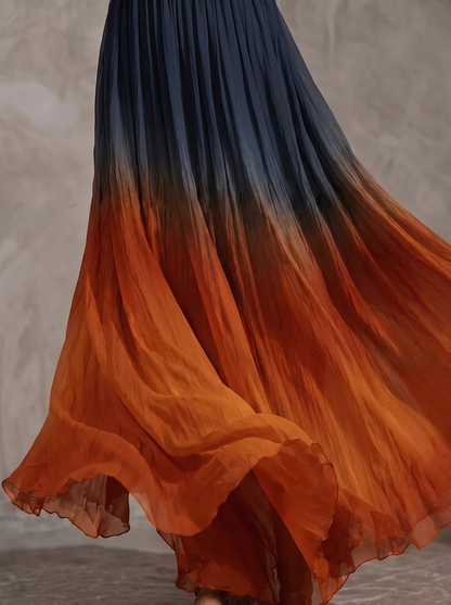 Dettaglio dell'orlo della gonna di Paula in chiffon increspato color ruggine, in studio