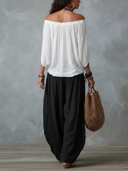 Pervinca, completo top spalle scoperte e pantalone a palloncino, bianco e nero