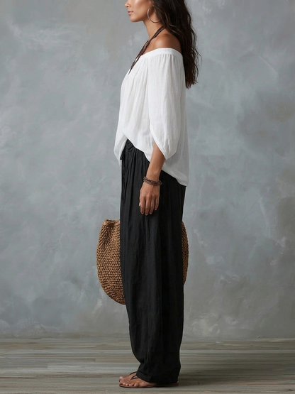 Pervinca, completo top spalle scoperte e pantalone a palloncino, bianco e nero