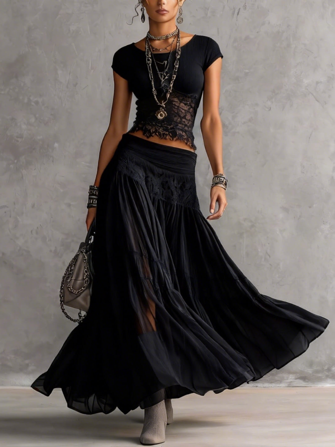 Egle | completo top in pizzo e gonna plissettata nero